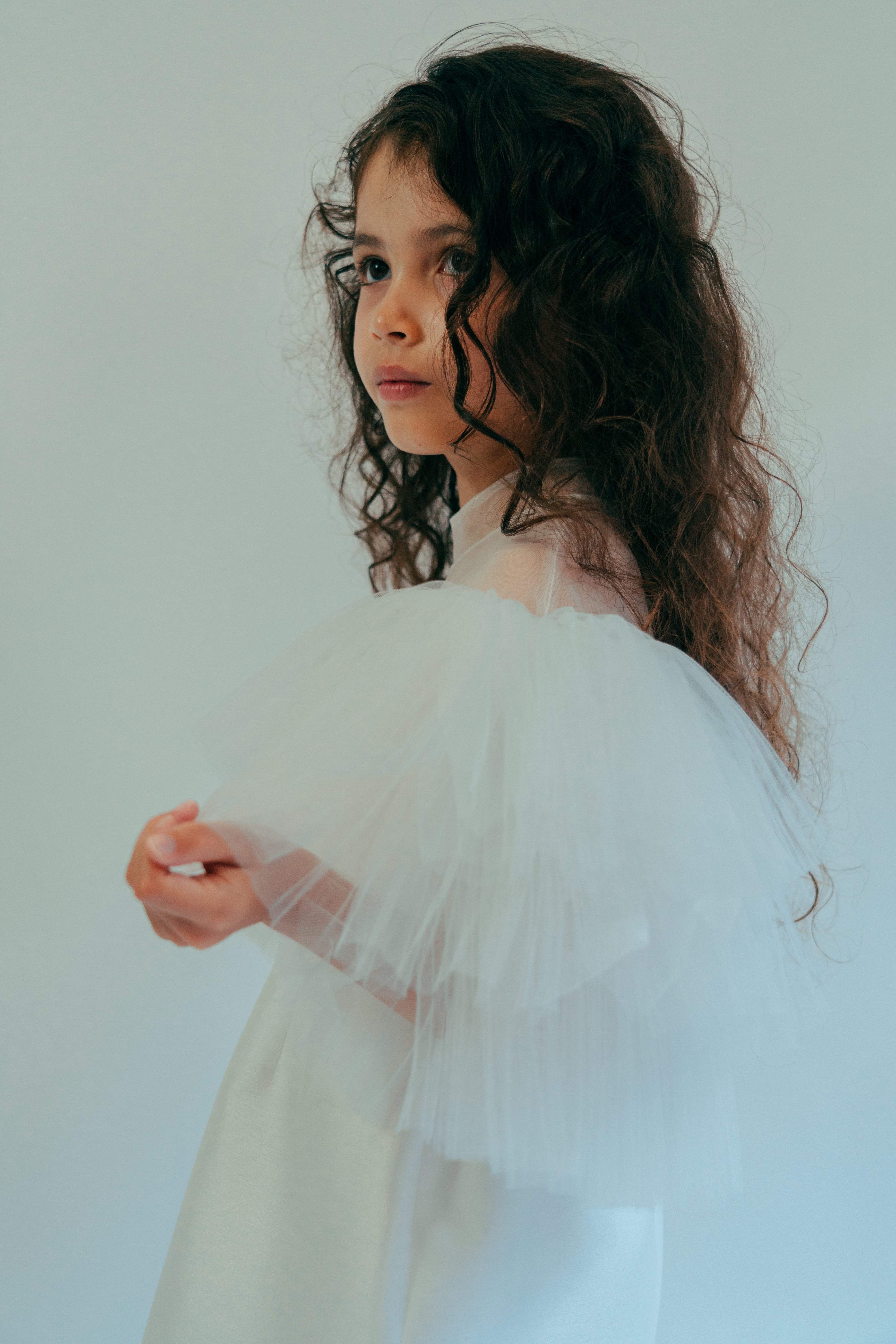 White dress for young girls with layered sleeves