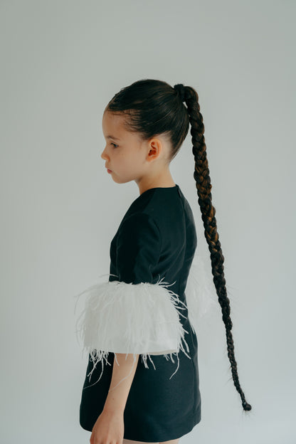 Slim dress with extravagant detail