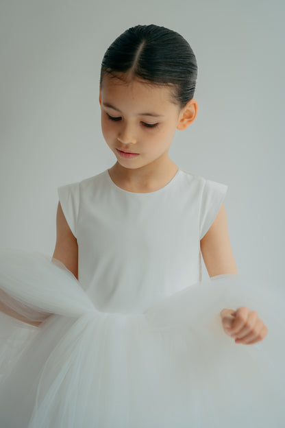 Girl admiring tulle details on her princess dress
