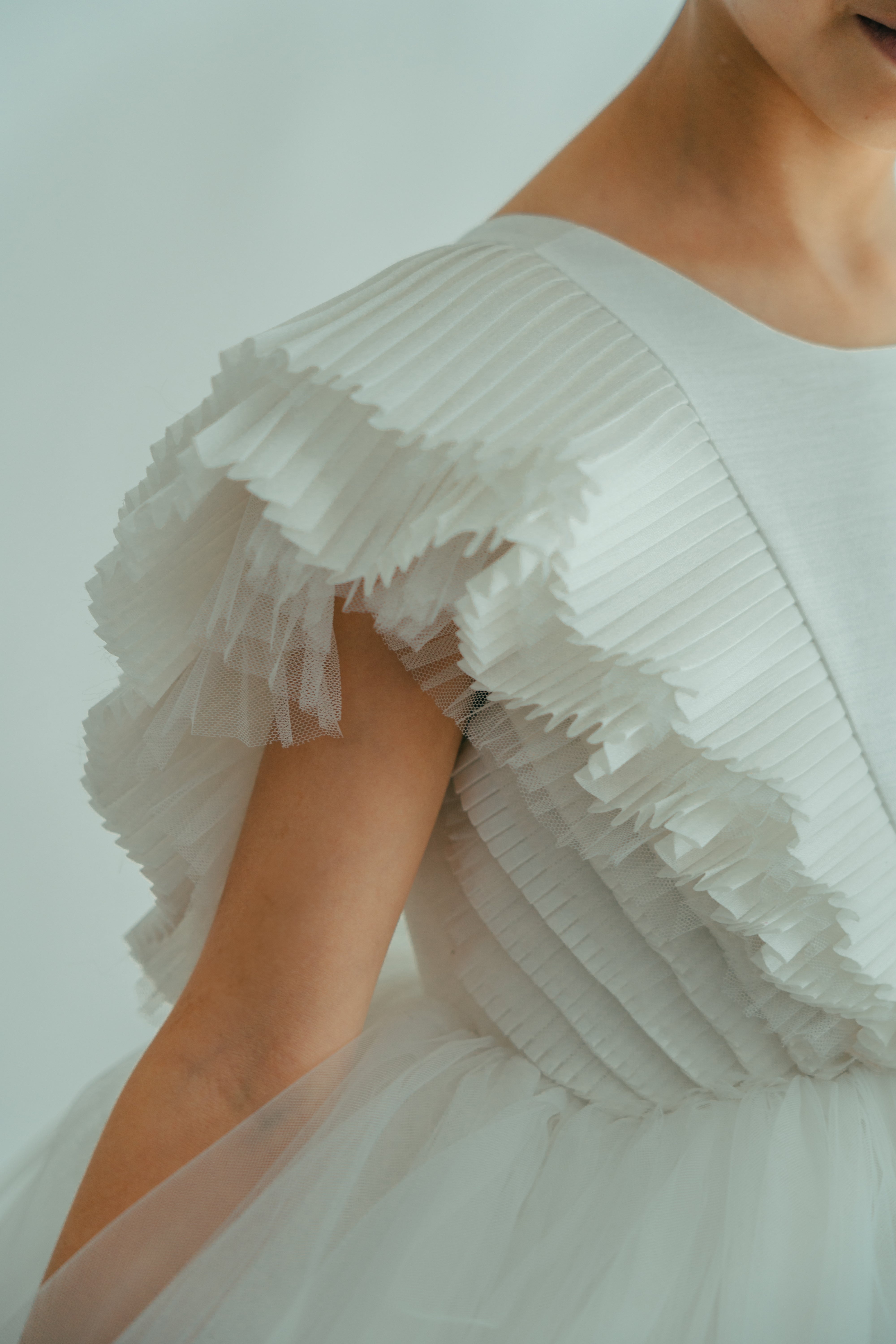 Close-up white flower girl dresses Emma